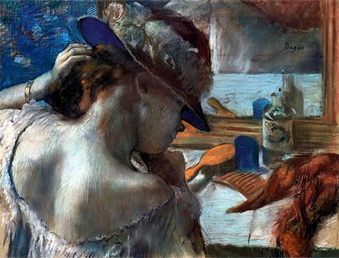 At the Mirror by Edgar Degas