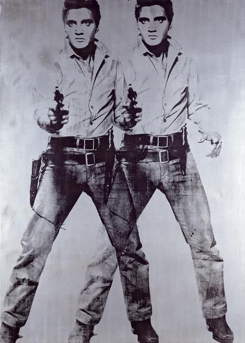 Andy Warhol con su famoso peinado blanco